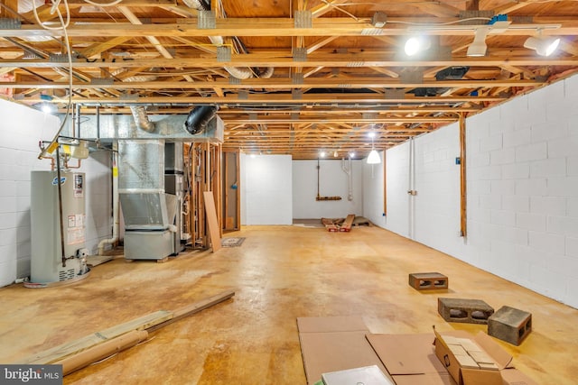 unfinished below grade area with water heater and heating unit