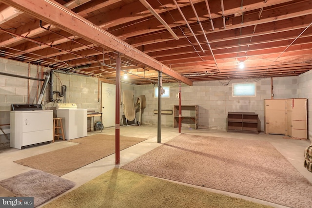 basement with washing machine and dryer
