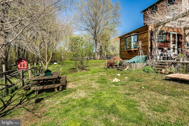 view of yard with fence