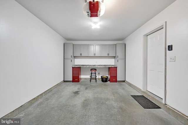 garage featuring a garage door opener
