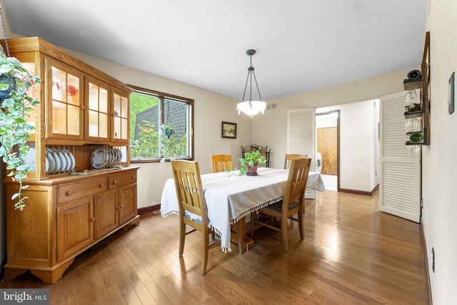 4025 Branches Ln, Doylestown, PA 18902 - dining space with visible vents, light wood-style flooring, and baseboards