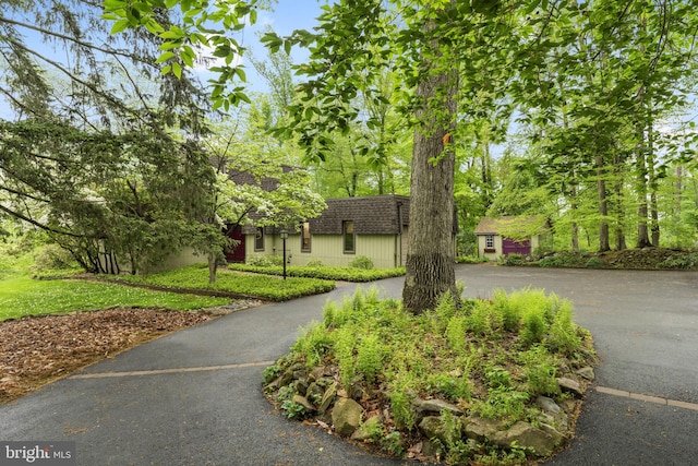 4025 Branches Ln, Doylestown, PA 18902 - view of front of property featuring driveway, roof with shingles, and mansard roof