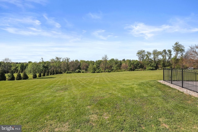 view of yard with fence