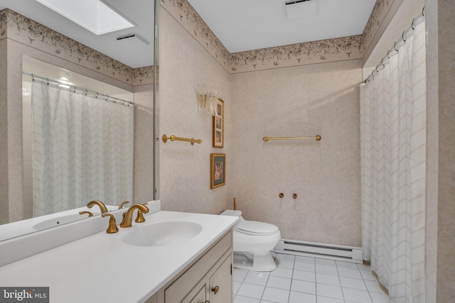 full bath featuring baseboard heating, curtained shower, tile patterned floors, vanity, and toilet