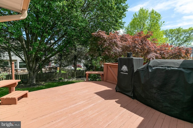 wooden deck featuring fence