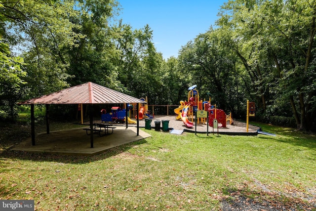 community play area featuring a gazebo and a lawn