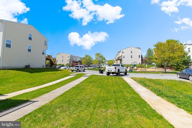 view of road with a residential view and sidewalks