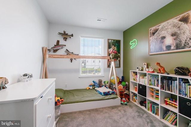 bedroom featuring carpet and visible vents