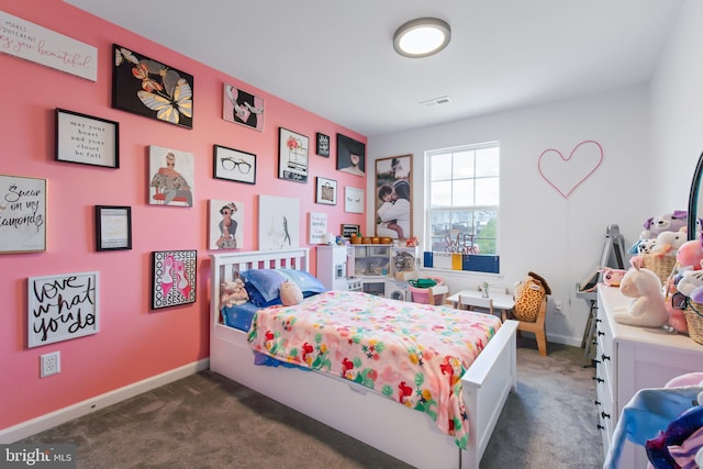 bedroom featuring visible vents, carpet, and baseboards