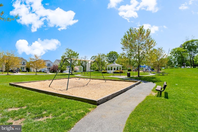 surrounding community with a gazebo, playground community, and a yard