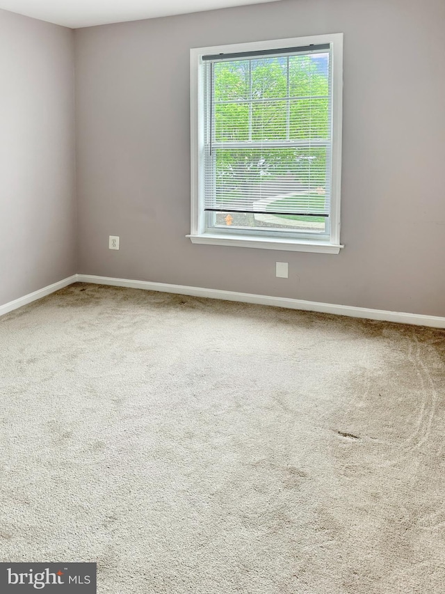 2208 Merion Pond Pond Unit 62, Woodstock, MD 21163 - carpeted empty room with baseboards