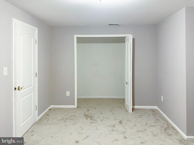 2208 Merion Pond Pond Unit 62, Woodstock, MD 21163 - unfurnished bedroom featuring baseboards, carpet, and visible vents