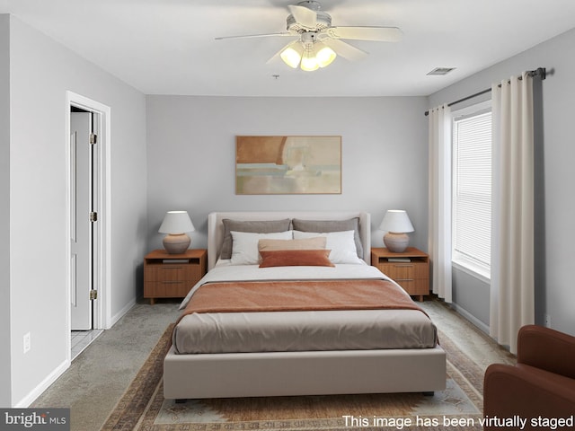 2208 Merion Pond Pond Unit 62, Woodstock, MD 21163 - bedroom with light colored carpet, baseboards, visible vents, and multiple windows