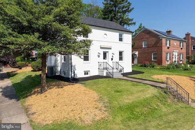 3500 The Alameda, Baltimore, MD 21218 - view of property featuring a front yard, central AC, and brick siding