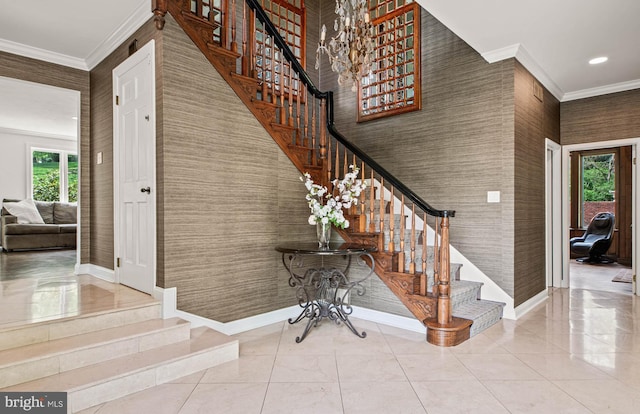 stairway featuring crown molding, an inviting chandelier, baseboards, recessed lighting, and tile patterned floors