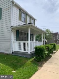 317 S Stokes St, Havre De Grace, MD 21078 - view of side of home featuring covered porch