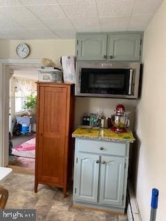 317 S Stokes St, Havre De Grace, MD 21078 - bar with stainless steel microwave and a paneled ceiling