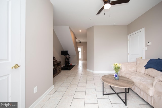 living area with a ceiling fan, baseboards, light tile patterned floors, and recessed lighting
