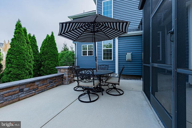 view of patio featuring outdoor dining space