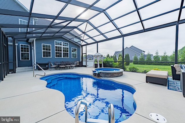 view of swimming pool with an outdoor living space, a patio area, a pool with connected hot tub, and a lanai