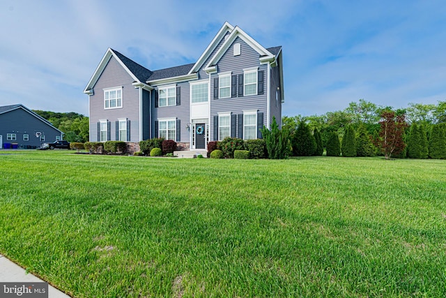 view of front of house with a front yard