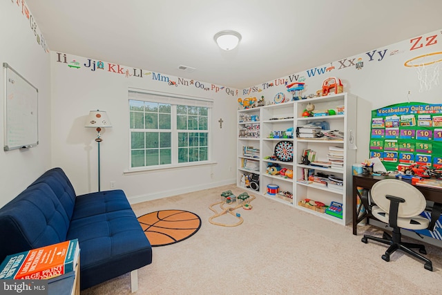 game room featuring baseboards, visible vents, and carpet