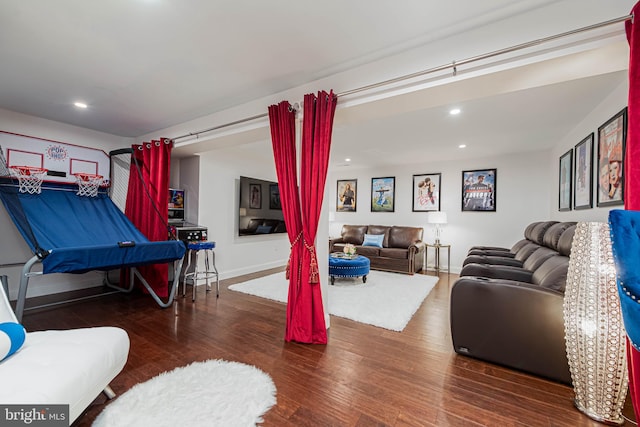 playroom featuring wood finished floors, baseboards, and recessed lighting