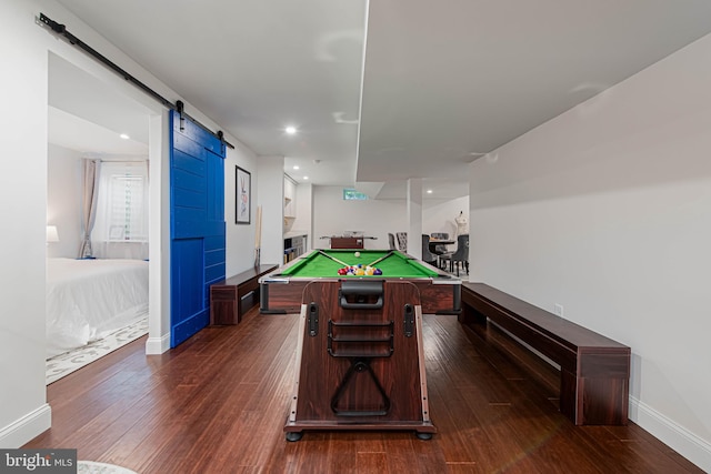 game room featuring a barn door, recessed lighting, dark wood finished floors, billiards, and baseboards
