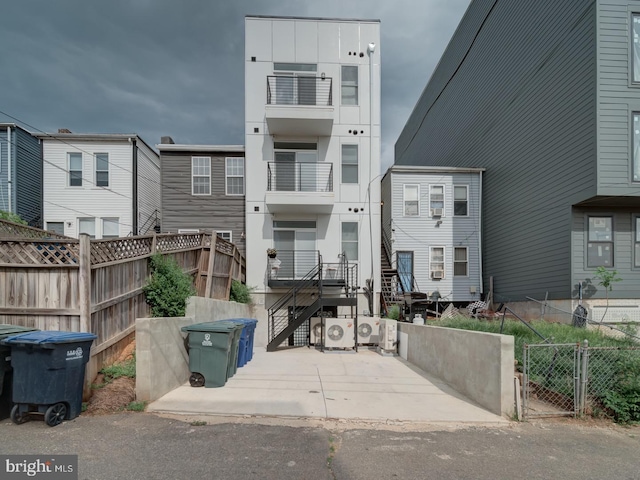 exterior space with fence and a gate