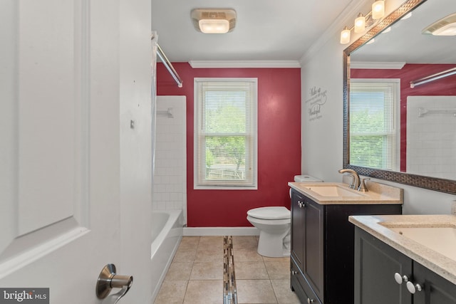 full bathroom featuring tile patterned floors, two vanities, ornamental molding, toilet, and a sink