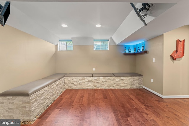 additional living space with wood finished floors
