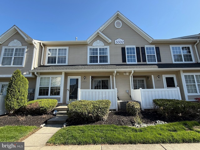 view of front of home featuring central air condition unit