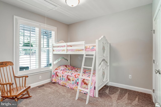 10935 Ravenwood Dr, Manassas, VA 20111 - carpeted bedroom with baseboards, attic access, and visible vents