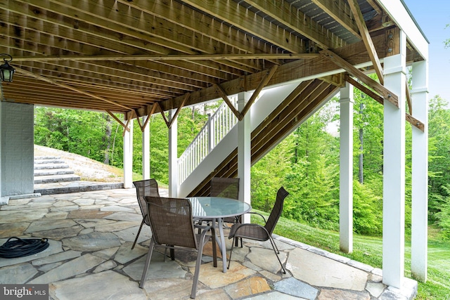 10935 Ravenwood Dr, Manassas, VA 20111 - view of patio with outdoor dining space and stairway
