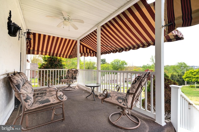 view of patio / terrace with a porch and ceiling fan