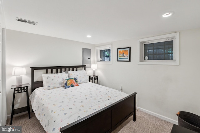 bedroom with carpet floors, recessed lighting, baseboards, and visible vents