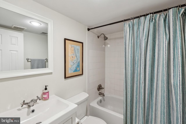 full bathroom featuring a sink, shower / bathtub combination with curtain, toilet, and visible vents