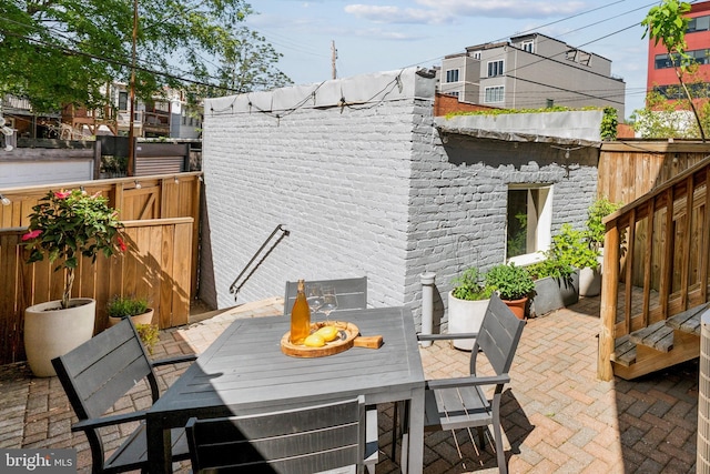 view of patio / terrace featuring outdoor dining area and a fenced backyard