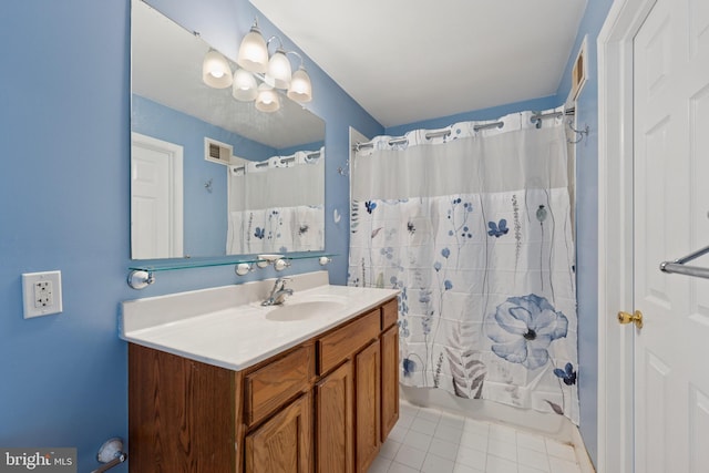 full bath featuring vanity, shower / tub combo, visible vents, and tile patterned floors