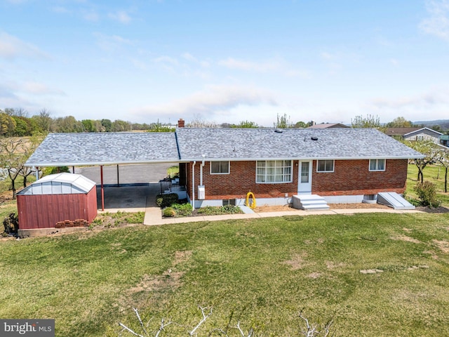 304 Snyder Rd, Reading, PA 19605 - rear view of house featuring a yard and brick siding