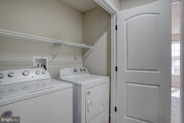 laundry area with laundry area and washing machine and dryer