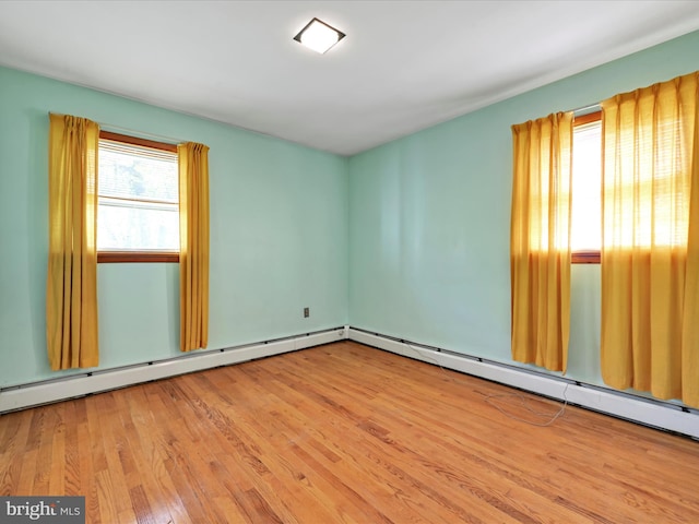 empty room featuring wood finished floors