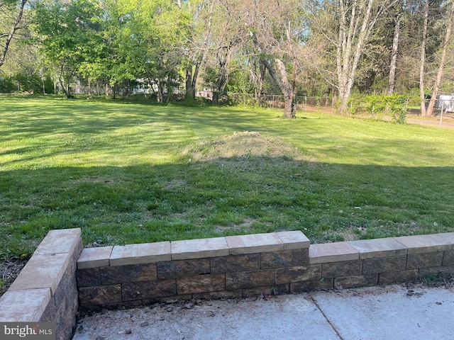 view of yard with fence
