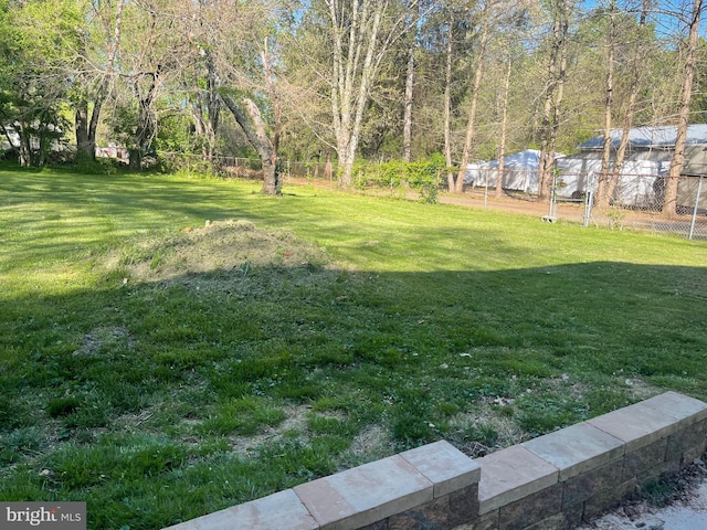 view of yard with fence