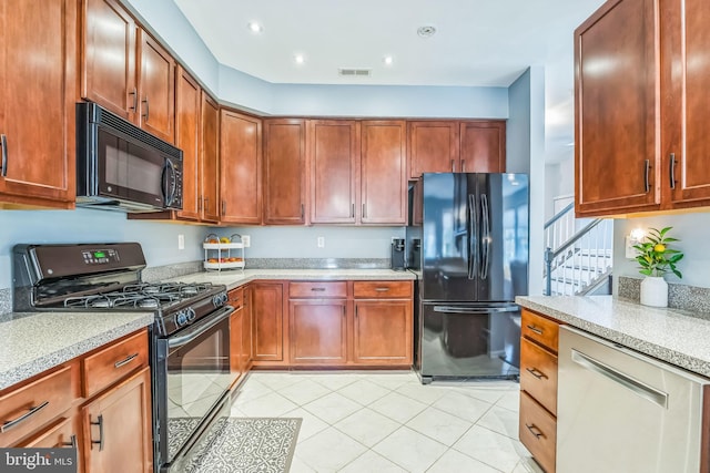 kitchen with black appliances, light tile patterned flooring, visible vents, and recessed lighting