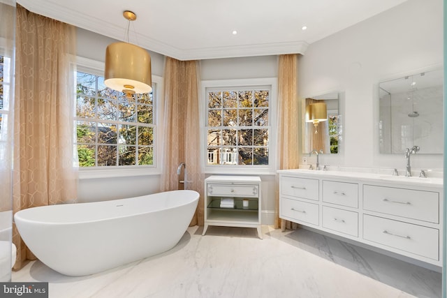 full bathroom featuring marble finish floor, double vanity, a sink, and a soaking tub