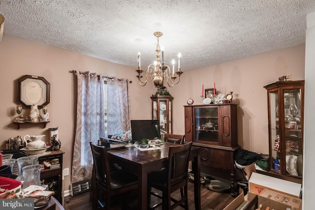 5135 Clark Canning House Rd, Federalsburg, MD 21632 - dining room featuring dark wood-style flooring, a textured ceiling, and a chandelier