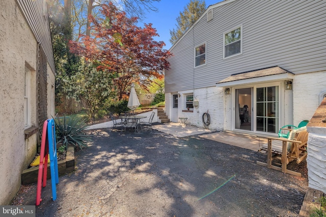view of patio with outdoor dining space