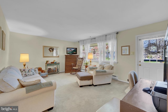 living area with baseboards, a baseboard heating unit, and light carpet
