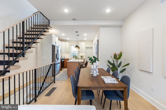 2131 Wharton St, Philadelphia, PA 19146 - dining area with recessed lighting, baseboards, visible vents, and light wood-style flooring